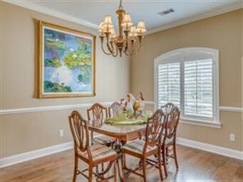 Crown molding, chair railing, plantation shutters 