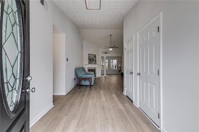 Foyer with light wood-type flooring