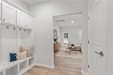 Garage is on the right, with custom built-ins in t