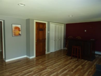 This living area is on the lower level, connected 