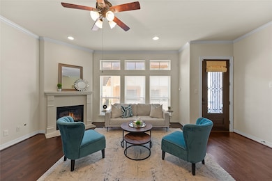 The living room has a working gas fireplace that l