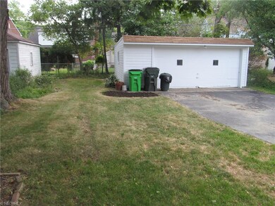 Over sized two car garage with opener and electric