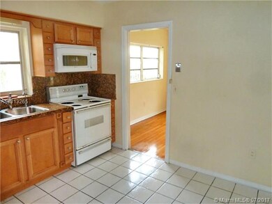 kitchen looking in to formal dining room