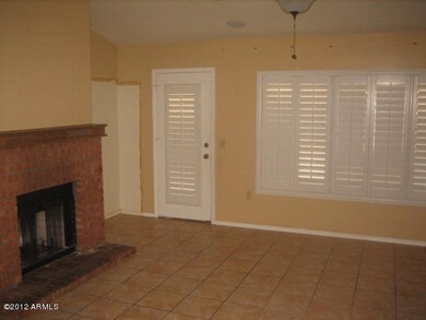 family room with fireplace-blinds closed
