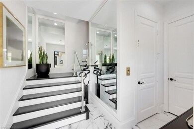 Stairs and elevator to 2nd level living
