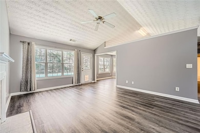 Living room with view to backyard and pool