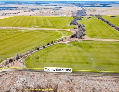 Birds eye view of property featuring a rural view