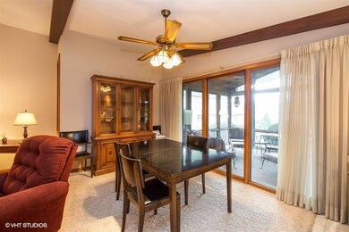 Eating area is at the end of the family room adjac