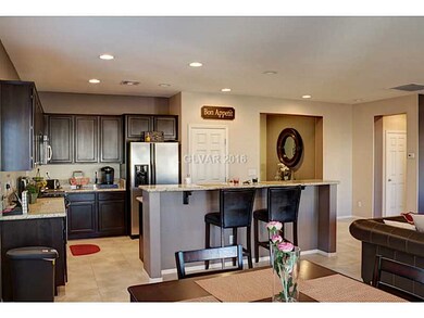 Property Photo. kitchen has island bar & sink
