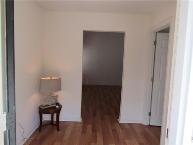 Foyer is spacious and entire home has new vinyl pl