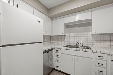 Fridge and dishwasher included.