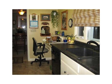 Kitchen. Sink and new dishwasher.