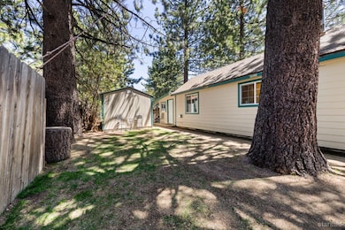 Side yard with outside storage shed