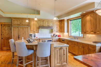 Chef's kitchen features Bar top island, walk in pa