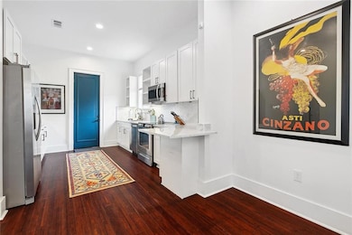 looking into kitchen from dining