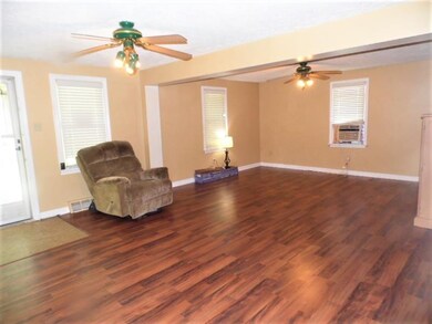 INCLUDES 2 LIGHTED CEILING FANS AND WINDOW AIR UNI