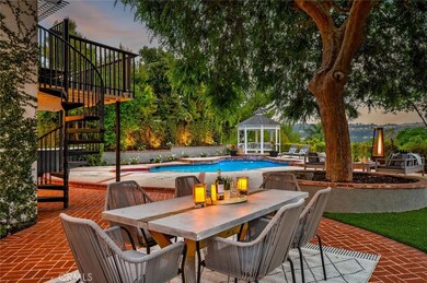 Can it get any better than this! Picturesque setting in this gorgeous backyard with Chinese Elm tree for shade and beauty!