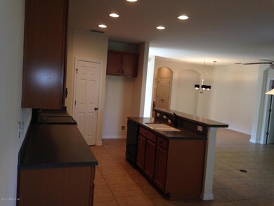 KITCHEN OPEN TO GREATROOM AND DINING RM