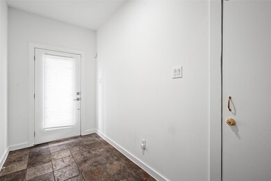 Elegant glass-paneled door that adds a touch of so