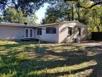 Double french doors to outdoor deck area