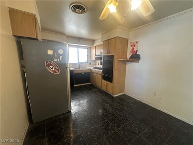 Kitchen featuring stainless steel appliances, base