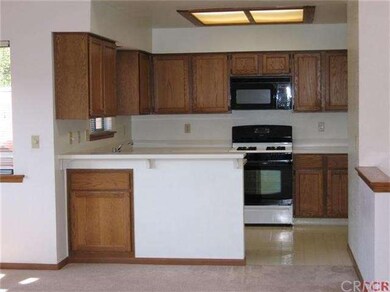 The kitchen has newer appliances.