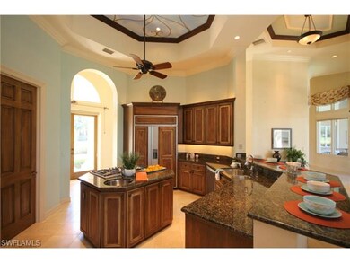 Kitchen with island, sink in island, gas cooktop, 