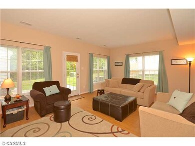 Living Room - The living room has laminate wood fl