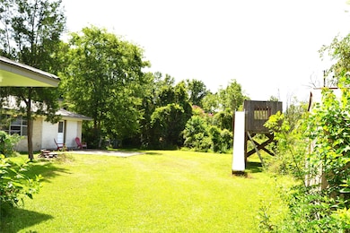 The lot is almost half an acre and the yard is per