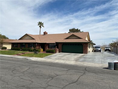 Ranch-style home with a chimney, a tiled roof, con