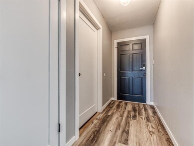 Doorway featuring hardwood / wood-style floors and