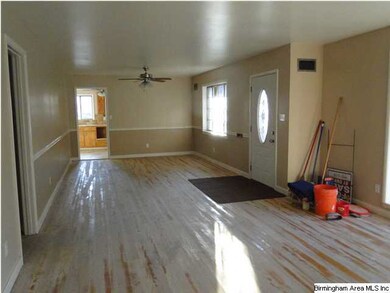 Large open formal dining and living areas.  Hardwo