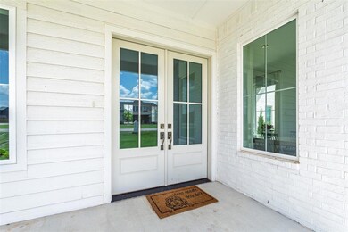 Entrance to property featuring french doors