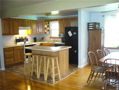 Kitchen. Open space between kitchen, dining room a