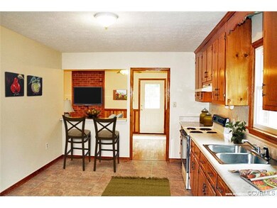 Great kitchen open to family room, new flooring.