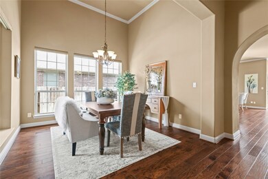 Formal dining room near entrance of home with high ceilings!