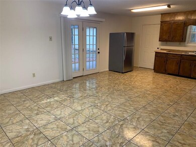 Large open kitchen and dining area.  Also features