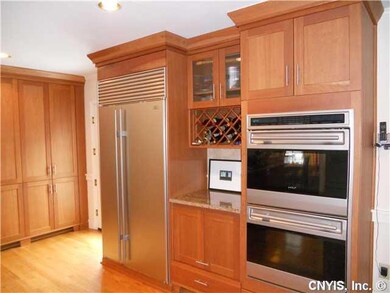 Kitchen. Pantry wall. Door to back yard. Gleaming 