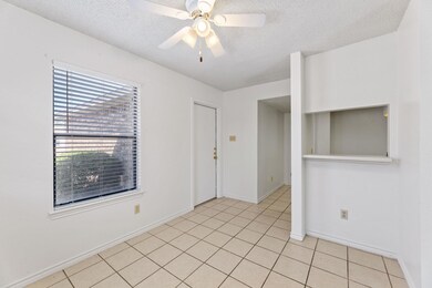 Spare room featuring a textured ceiling, a ceilin