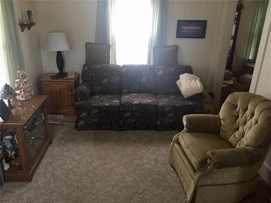 14x10 Living Room has newer carpeting.