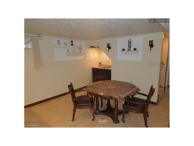 Lower Level Rec Room Wet Bar and Tiled area with T