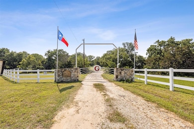 Gated entry into this 10-acre estate