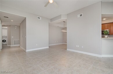 Empty room featuring visible vents, washer / cloth