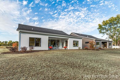 new back with furniture and yard october