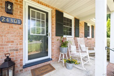 Property entrance with covered porch