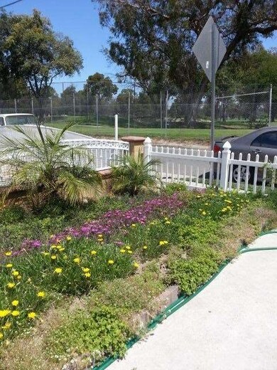 FRONT GARDEN LOOKING OUT TO WILLOWICK GOLF COURSE