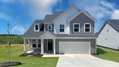Front Exterior of The Cameron Design by DRB Homes