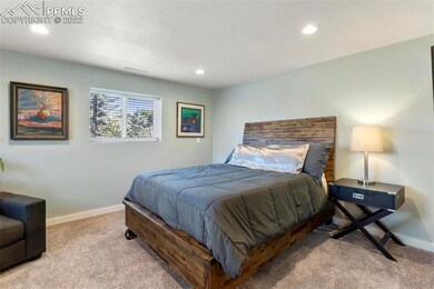 Family room in basement currently being used as gu