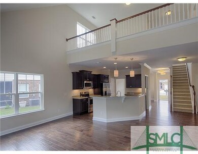 Den/Family/Great Room. Great room looking into ope