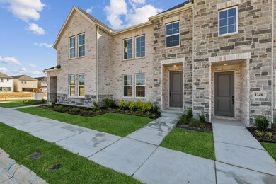 With a stunning brick and stone exterior, this hom